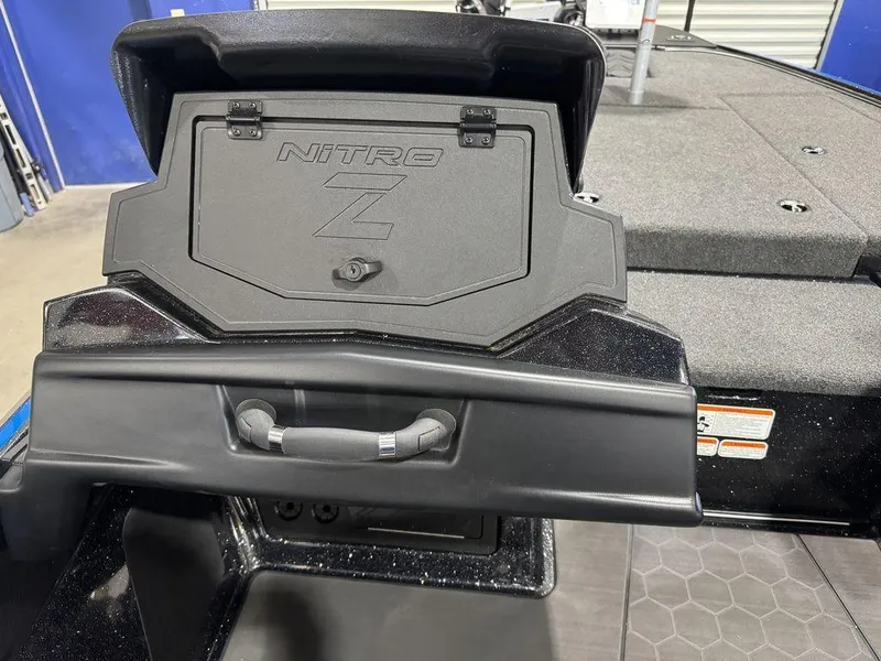 Slide: The Image of 2022 Nitro Z19 Pro boat dashboard with storage compartment and handle. - 46