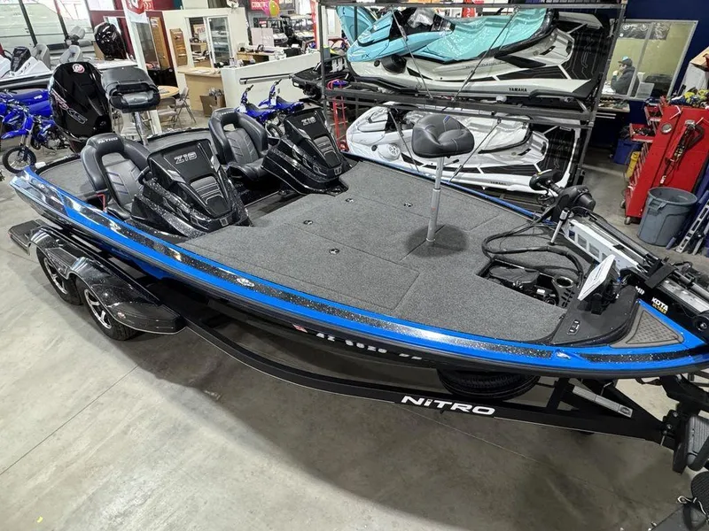 Slide: The Image of 2022 Nitro Z19 Pro fishing boat with blue accents in showroom. - 6