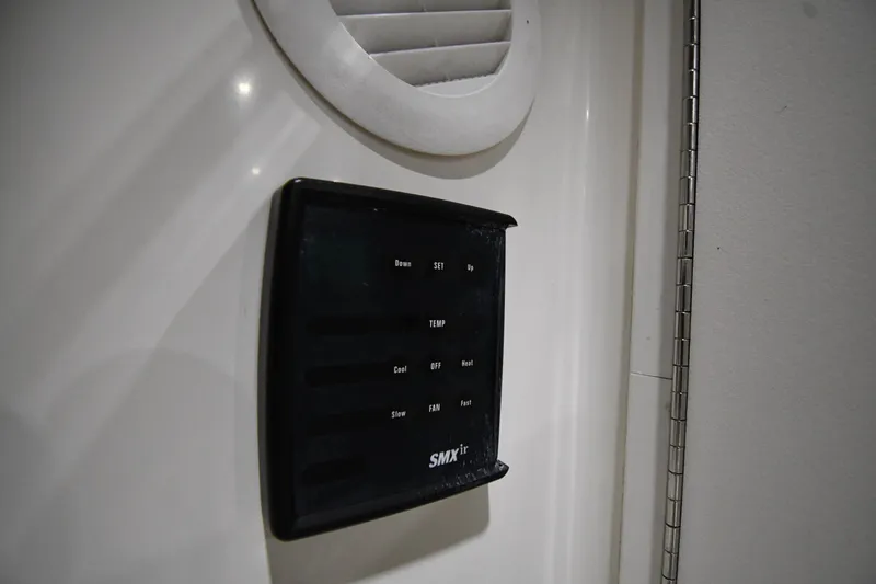 Slide: The Image of Control panel on 2000 Sea Ray 370 Express Cruiser boat interior. - 21