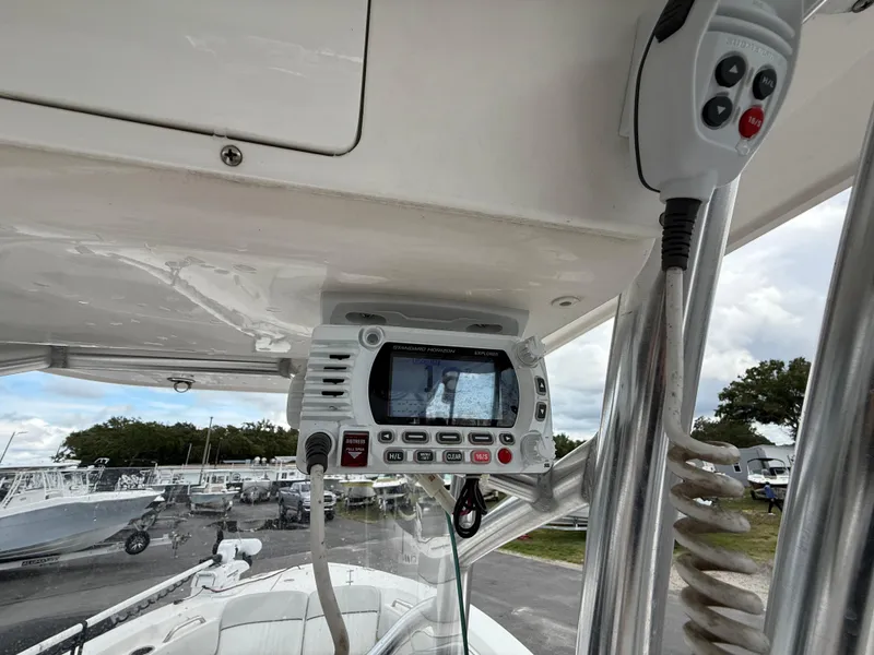 Slide: The Image of 2021 Sea Fox 228 Commander boat with marine radio and control panel. - 32