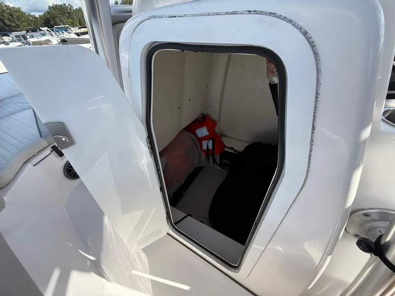 Slide: The Image of Open storage compartment on 2021 Sea Fox 228 Commander boat, showing interior space. - 40