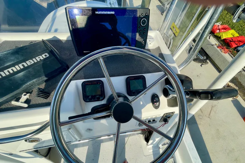 Slide: The Image of Steering console of 2016 Shallow Sport 18 Sport boat with Humminbird electronics. - 9