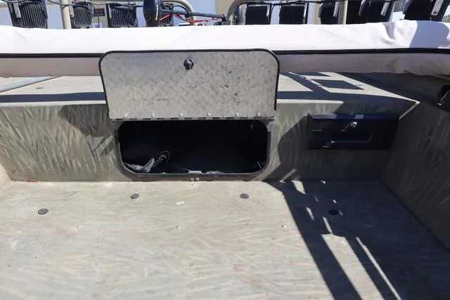 Slide: The Image of 2016 Tracker Grizzly 1860 MVX boat interior storage compartment. - 12