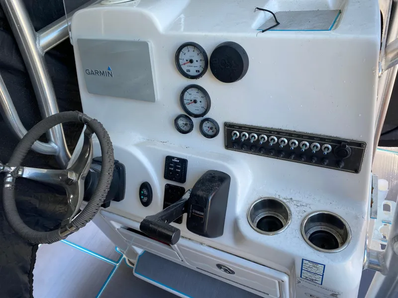 Slide: The Image of Control panel of 2016 Tidewater 2200 Carolina Bay boat with Garmin system. - 13