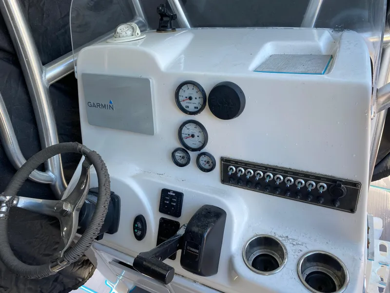 Slide: The Image of Control panel of 2016 Tidewater 2200 Carolina Bay boat with Garmin system. - 14