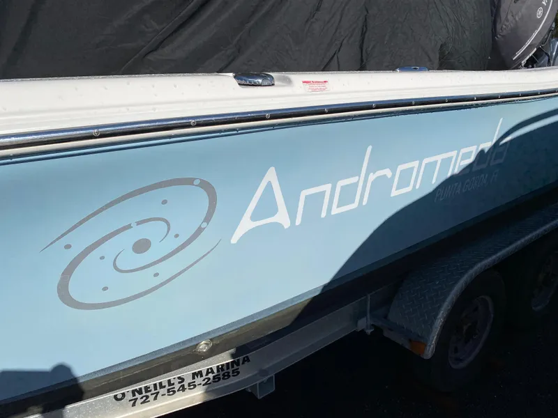 Slide: The Image of 2016 Tidewater 2200 Carolina Bay boat with "Andromeda" logo on trailer. - 4