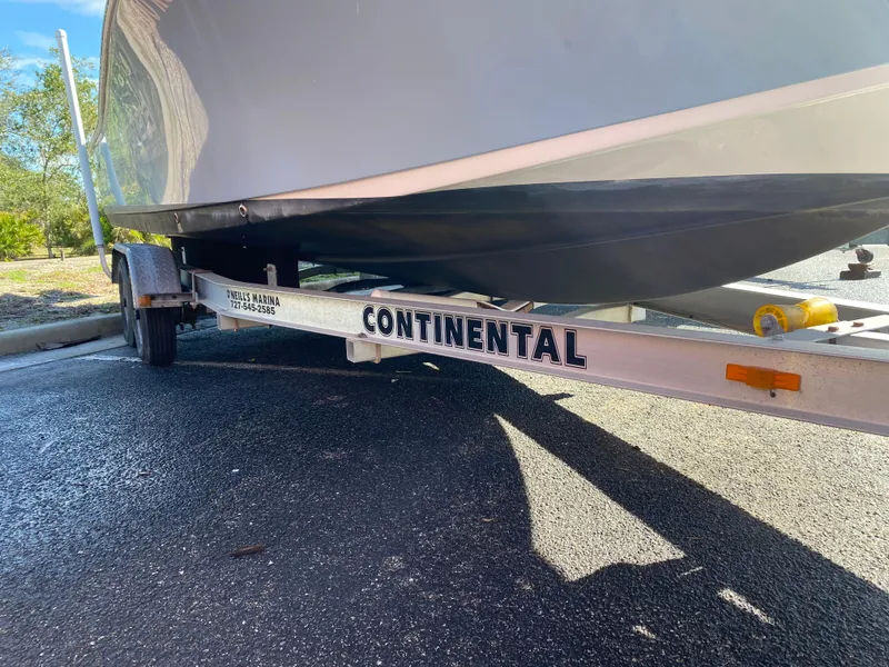 Slide: The Image of 2016 Tidewater 2200 Carolina Bay boat on Continental trailer in parking lot. - 6