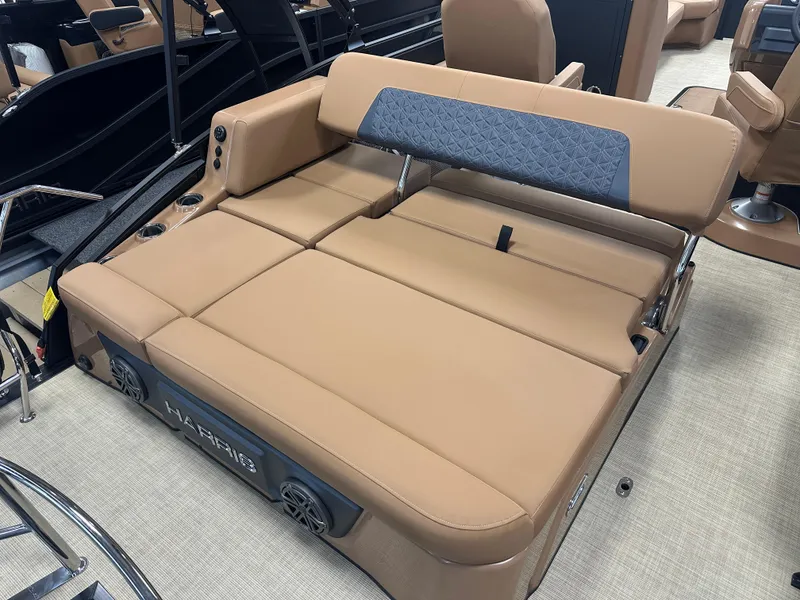 Slide: The Image of 2025 Harris Solstice 250 boat interior with tan seating and adjustable backrest. - 11