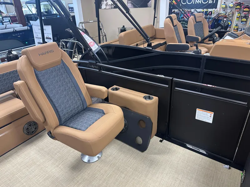 Slide: The Image of 2025 Harris Solstice 250 boat interior with tan and gray seating. - 6