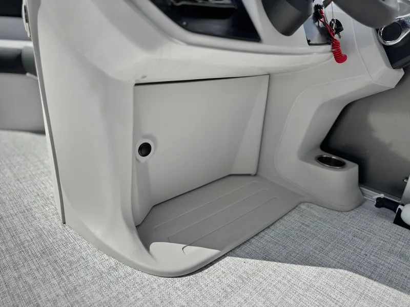 Slide: The Image of Interior view of 2025 Berkshire 18 CR SE boat, featuring sleek design and storage space. - 18