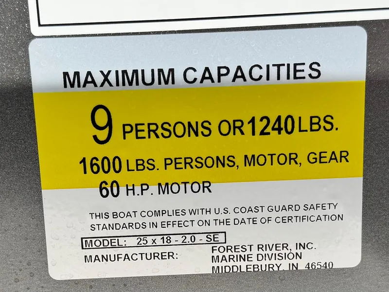 Slide: The Image of Capacity label for 2025 Berkshire 18 CR SE boat, 9 persons or 1240 lbs, 60 HP motor. - 19