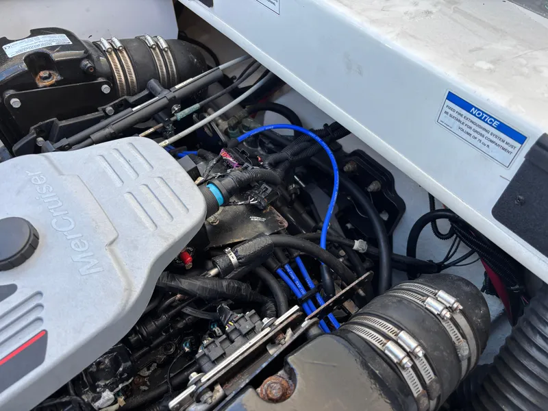 Slide: The Image of Engine compartment of a 2014 Sea Ray 205 Sport boat. - 19