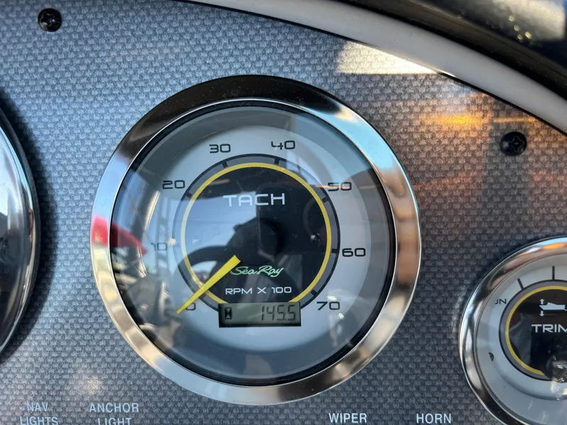 Slide: The Image of Tachometer of 2014 Sea Ray 205 Sport boat showing RPM reading. - 40