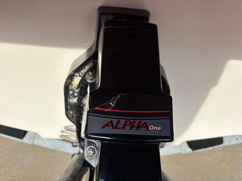 Slide: The Image of Alpha One outdrive on 2014 Sea Ray 205 Sport boat. - 48