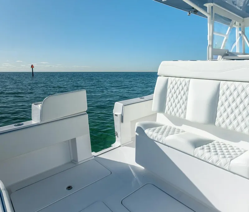 Slide: The Image of 2026 Invincible 36 Open Fisherman boat interior with ocean view. - 10