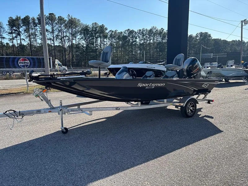 The Image of 2025 G3 Sportsman 1710 boat on trailer, parked outdoors. - 1