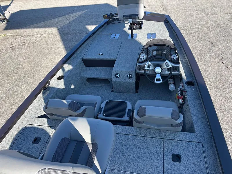 Slide: The Image of 2025 G3 Sportsman 1710 boat interior with steering console and seating. - 9