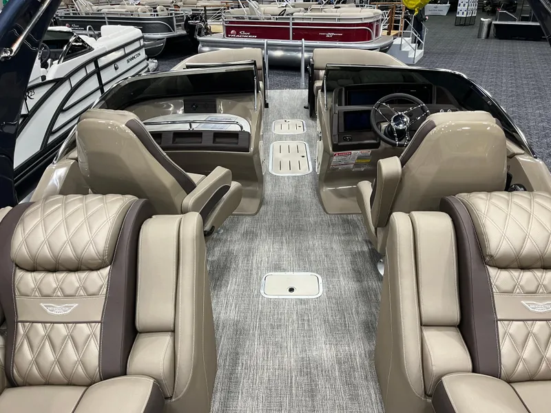 Slide: The Image of Luxurious interior of 2025 Bennington Q Line boat with plush seating and modern design. - 2