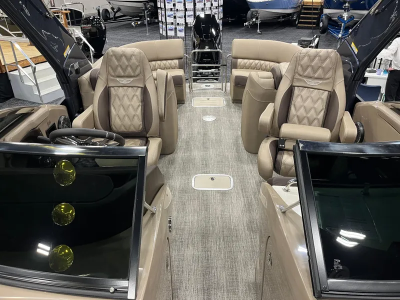 Slide: The Image of 2025 Bennington Q Line boat interior with luxurious seating and modern design. - 5