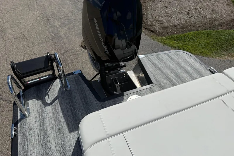 Slide: The Image of 2025 Bennington R Line boat with Mercury engine and swim platform. - 14