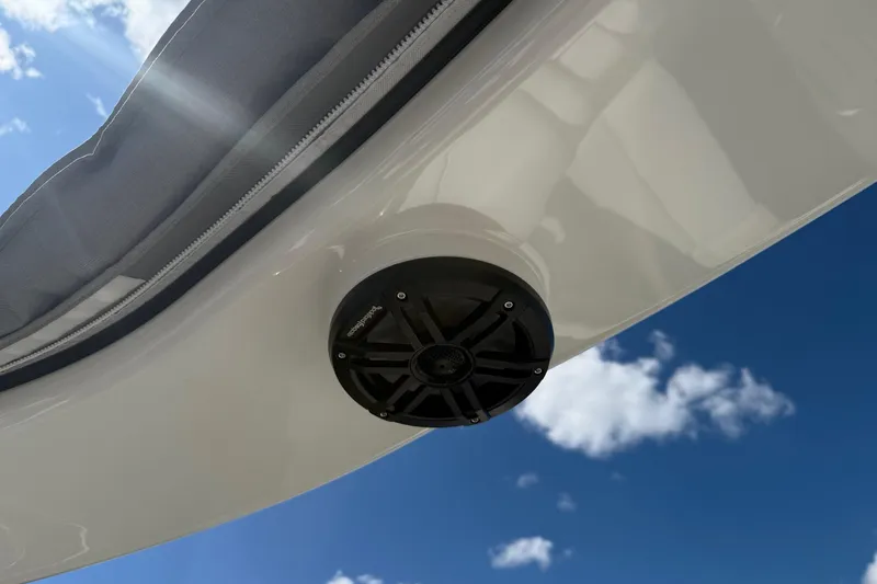 Slide: The Image of 2025 Bennington R Line boat speaker against a clear blue sky. - 21