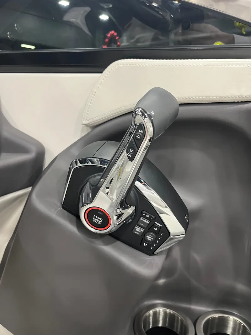 Slide: The Image of 2025 Bennington R Line throttle control in a sleek, modern boat interior. - 7