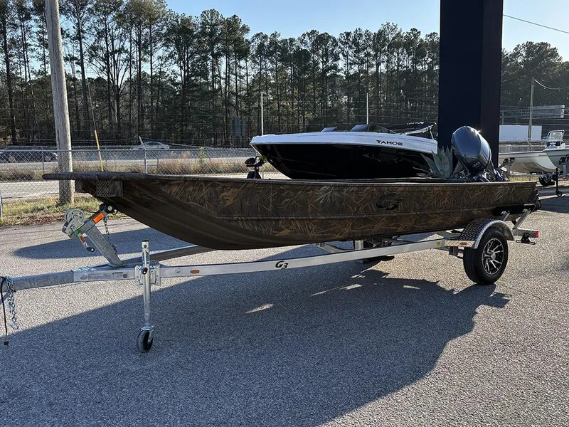 The Image of 2025 G3 Gator Tough 16 FL boat on trailer, parked outdoors. - 1