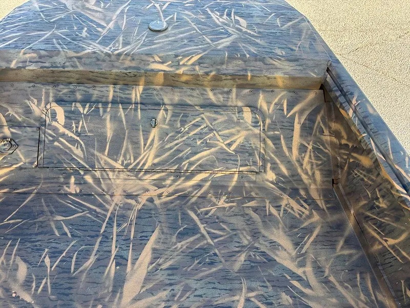 Slide: The Image of 2025 G3 Gator Tough 16 FL boat interior with camouflage pattern. - 12