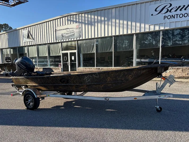 Slide: The Image of 2025 G3 Gator Tough 16 FL boat on trailer outside dealership. - 5