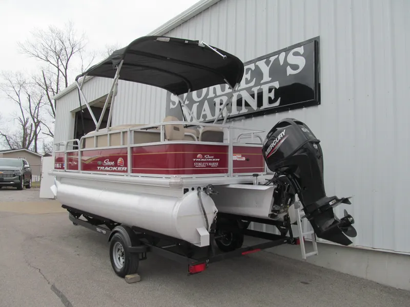 Slide: The Image of 2022 Sun Tracker Bass Buggy 18 DLX pontoon boat at Storey's Marine. - 2