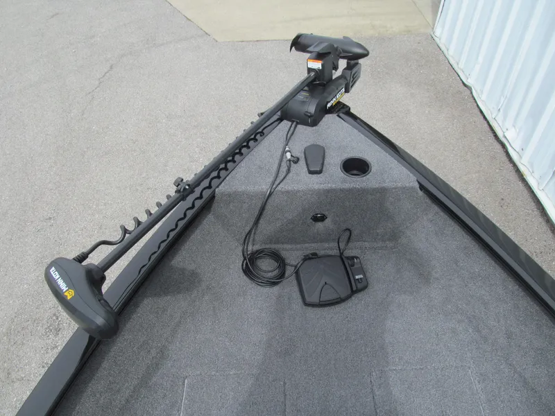 Slide: The Image of 2024 Tracker Super Guide V-16 SC boat with trolling motor on deck. - 10