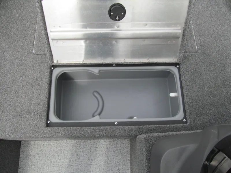 Slide: The Image of 2024 Tracker Super Guide V-16 SC boat storage compartment, open and empty. - 8