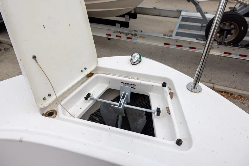 Slide: The Image of Open anchor compartment on 2019 Robalo R180 Center Console boat. - 11