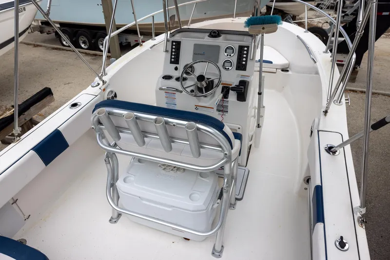 Slide: The Image of 2019 Robalo R180 Center Console boat interior with steering wheel and seating. - 5