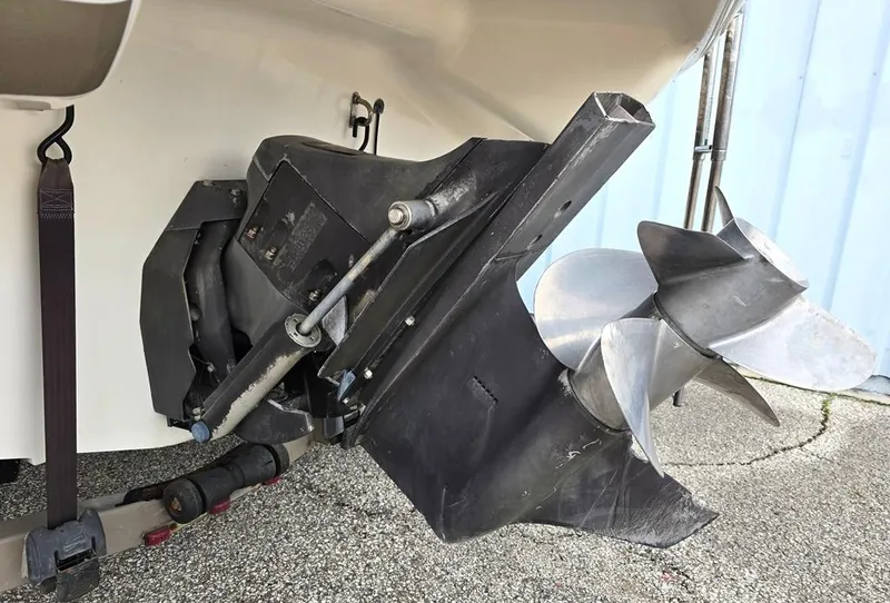 Slide: The Image of 2006 Larson LXI 268 BR boat propeller and stern drive detail. - 13