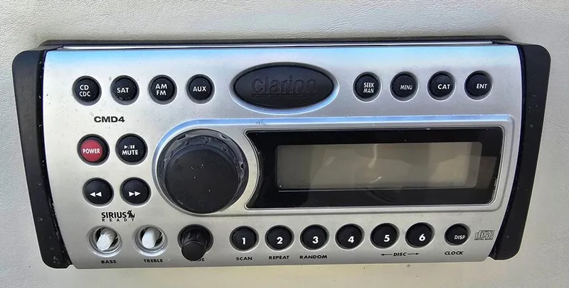 Slide: The Image of Clarion CMD4 stereo system in a 2006 Larson LXI 268 BR boat. - 18