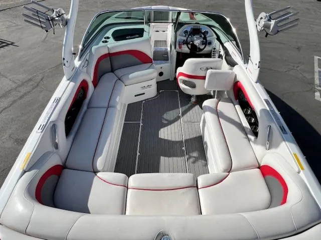 Slide: The Image of 2011 Centurion ENZO 240 boat interior with white and red seating. - 11