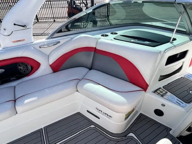 Slide: The Image of Interior of 2011 Centurion ENZO 240 boat with white and red seating. - 13