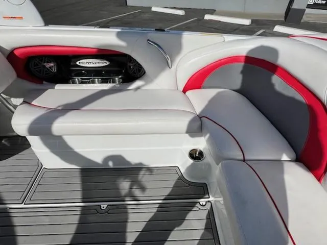 Slide: The Image of Interior of 2011 Centurion ENZO 240 boat with white and red seating. - 16