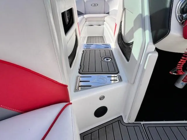 Slide: The Image of Interior of a 2011 Centurion ENZO 240 boat with sleek seating and modern design. - 17