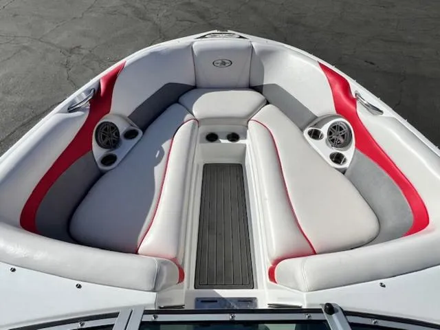 Slide: The Image of Bow seating area of 2011 Centurion ENZO 240 boat with red and gray upholstery. - 18