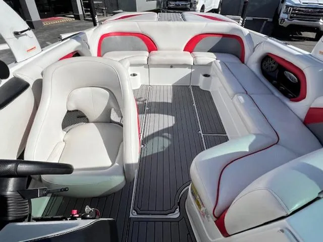 Slide: The Image of Interior of 2011 Centurion ENZO 240 boat with white and red seating. - 19