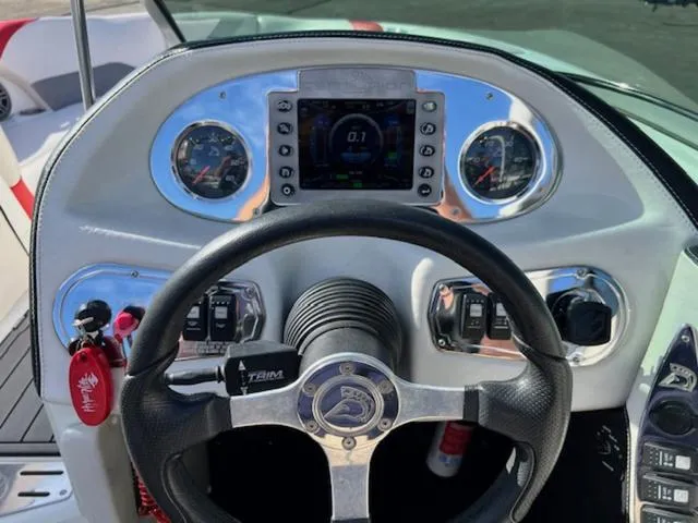 Slide: The Image of Steering wheel and dashboard of 2011 Centurion ENZO 240 boat. - 20