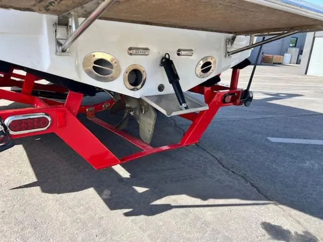 Slide: The Image of Rear view of 2011 Centurion ENZO 240 boat on red trailer. - 8