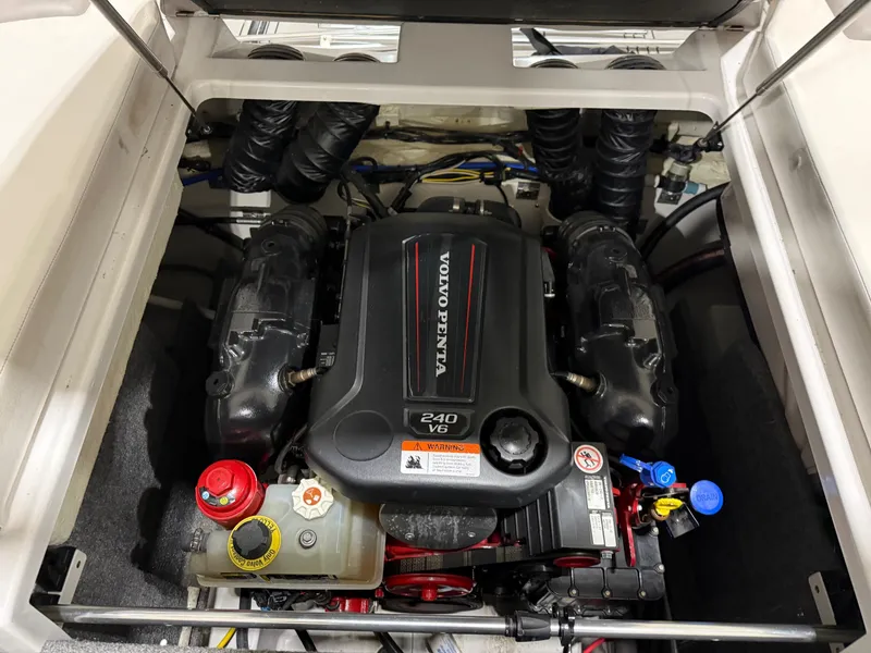 Slide: The Image of Volvo Penta engine in 2018 Four Winns H210 boat, showcasing V6 240 horsepower. - 34