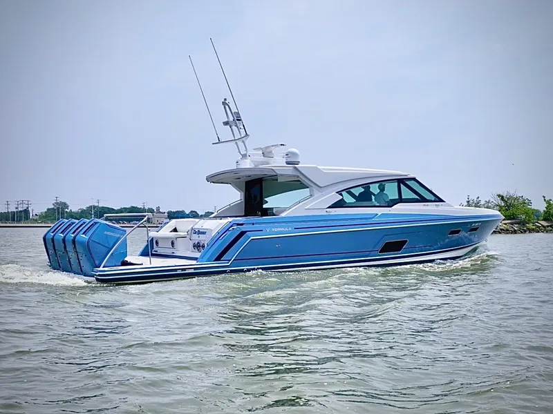 Slide: The Image of 2023 Formula 500 Super Sport Crossover boat cruising on water. - 10