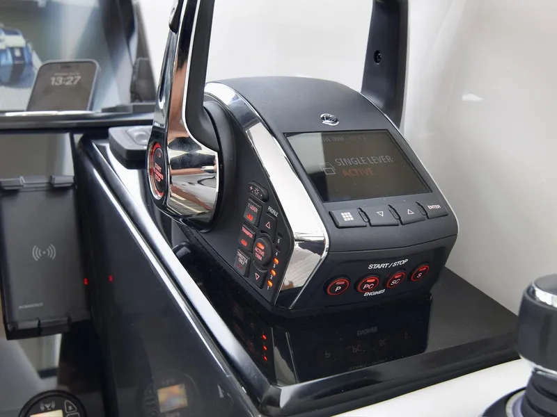 Slide: The Image of 2023 Formula 500 Super Sport Crossover control panel with digital display and buttons. - 22