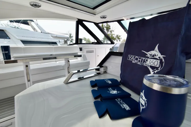 Slide: The Image of 2023 Formula 500 Super Sport Crossover yacht interior with Yachts360 branded items. - 24