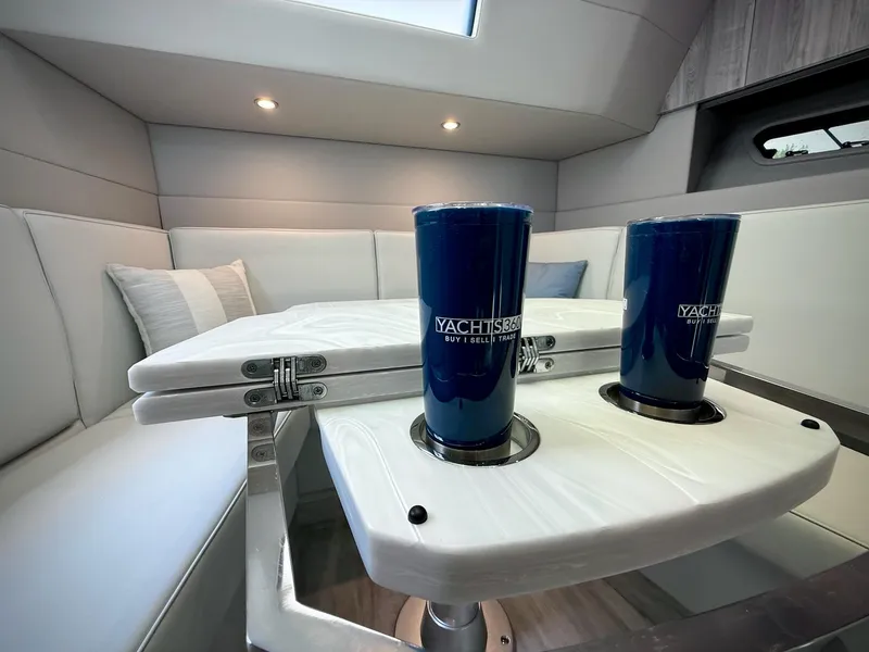 Slide: The Image of Interior of 2023 Formula 500 Super Sport Crossover with table and branded cups. - 27