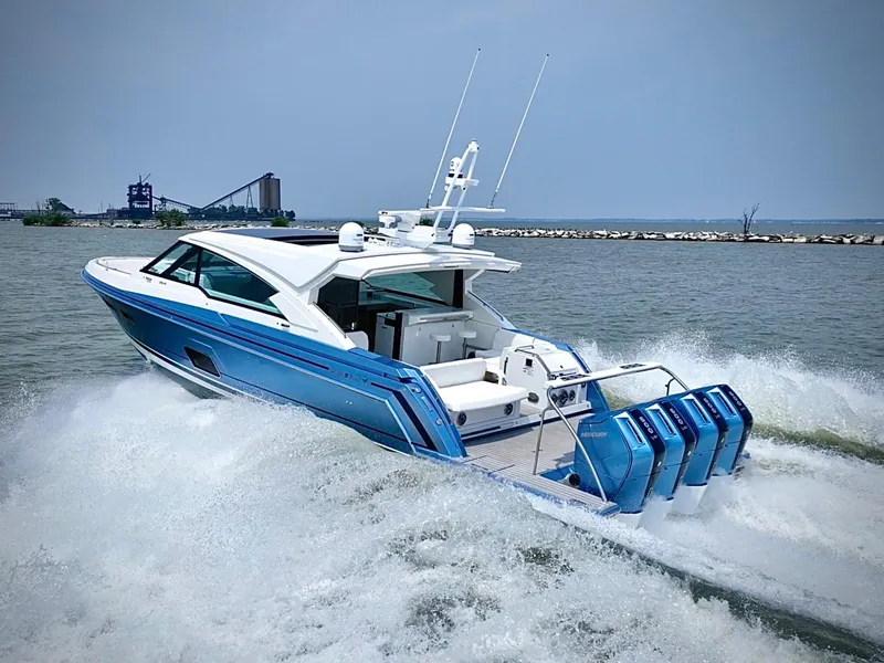 Slide: The Image of 2023 Formula 500 Super Sport Crossover cruising on water with powerful engines. - 3